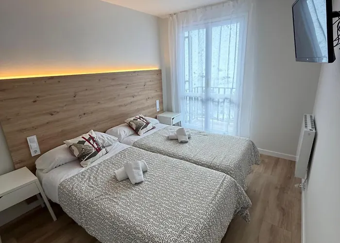 Pirineos Rent 칸단추